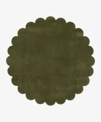 Top down view of the circular Forest Mirage green hand tufted wool rug on a white background showing the scalloped border.