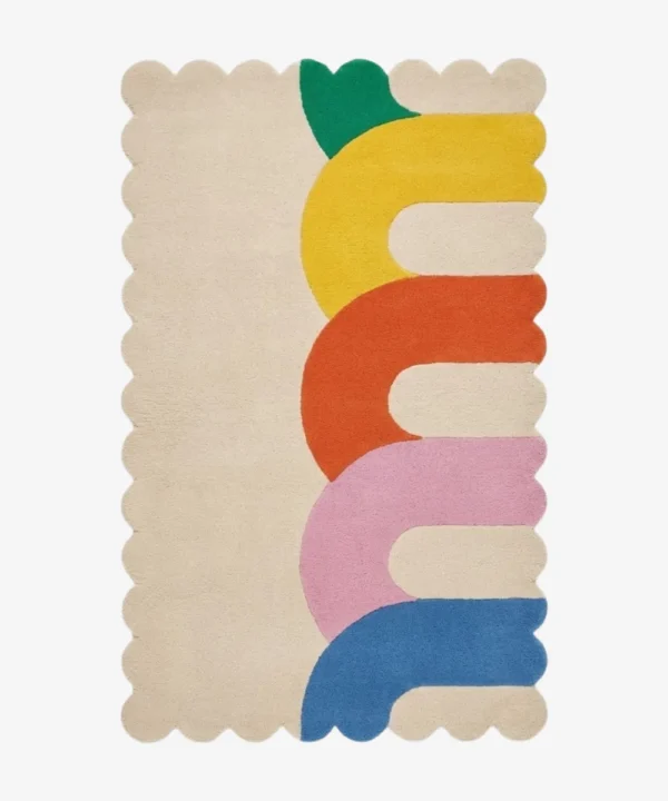 Top down view of the Rainbow Arcana rug featuring a soft cream background with colorful geometric rainbow arches in green yellow orange pink and blue.