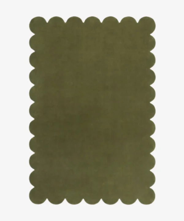 Top down flat lay view of the Stone Whisper rug featuring a solid earthy olive green color and decorative scalloped borders isolated on a white background.