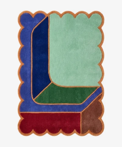 Top down view of the Soft Lagoon rug featuring a calming teal green wool background with a delicate geometric grid pattern and custom scalloped edges.