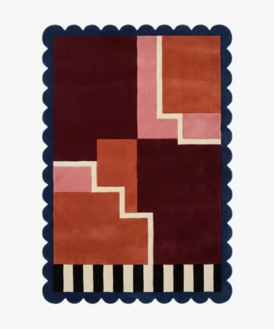 Top down view of the Stepped Field rug featuring a rhythmic geometric step pattern in earthy field tones on a plush wool background, finished with custom scalloped edges.