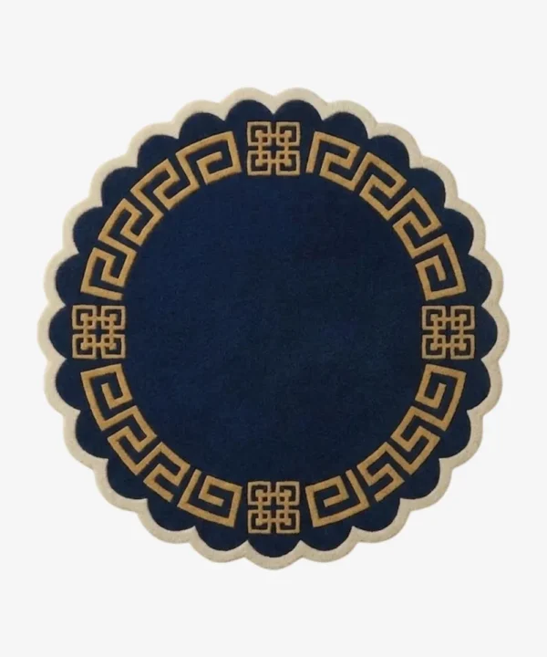 A top-down flat lay view of the entire round Aurexion Loop rug against a grey studio background, showcasing its complete circular shape, the thick abstract charcoal grey continuous loop pattern on a cream field, and the charcoal scalloped edge.