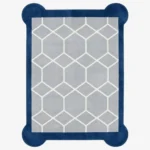 Top-down, flat view of the rectangular Azure Lattice Scallop Rug on a white background. The design showcases a light grey center with a white honeycomb lattice pattern, framed by a thick dark blue border with unique rounded corner details.