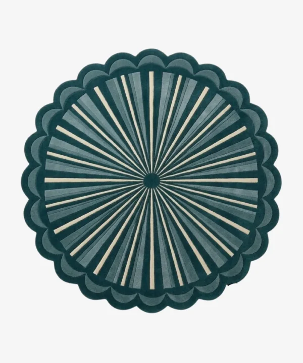 A top-down, flat view of the Emerald Sunburst Round Rug isolated on a clean white background. The design showcases a central green circle with radiating teal, emerald, and cream sunburst stripes, surrounded by a thick, scalloped dark green border.
