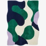 Full top-down view of the Emerald Mosaic rug isolated against a white background, showcasing its custom wavy borders and flat colorful geometric pattern.