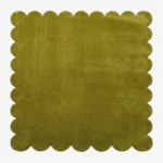 Top-down view of the solid green Mossline Rug showcasing its square shape and scalloped edges.