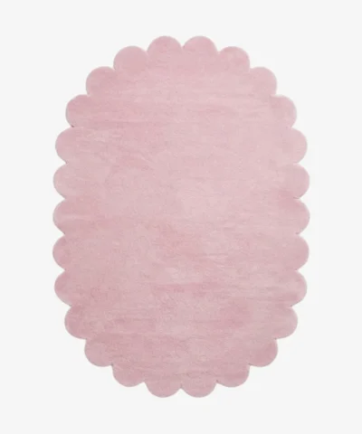 Top-down view of the oval Rosy Mellow Pink Scalloped rug isolated on a white background, showcasing its symmetrical scalloped border.