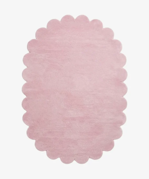 Top-down view of the oval Rosy Mellow Pink Scalloped rug isolated on a white background, showcasing its symmetrical scalloped border.