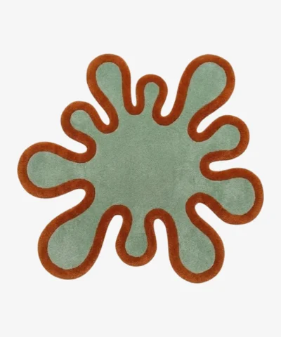 Full top-down view of the Sage Orbit rug isolated on a white background, featuring a flat splash-shaped silhouette in solid sage green with a thick terracotta orange border.