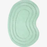 Top-down view of the Sage Ripple Irregular rug isolated on a white background, featuring a kidney-shaped organic silhouette with concentric carved lines in a solid sage green color.