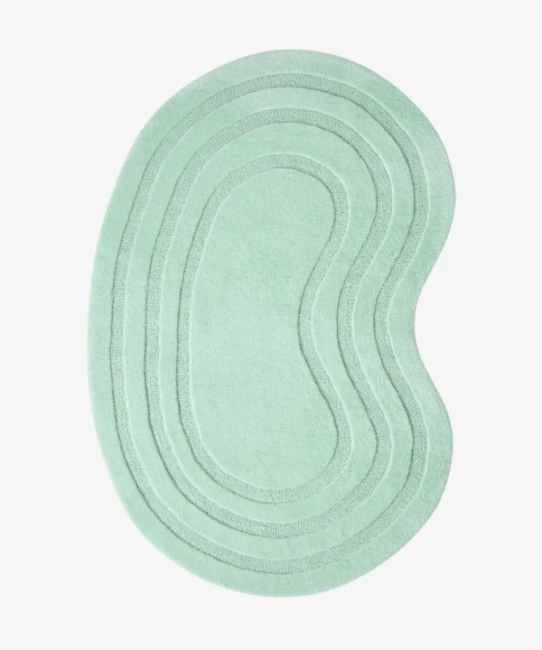 Top-down view of the Sage Ripple Irregular rug isolated on a white background, featuring a kidney-shaped organic silhouette with concentric carved lines in a solid sage green color.