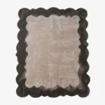 Top-down view of the Smokewood Mist rug isolated on a white background, featuring a textured off-white center framed by a dark gray wavy scalloped border.