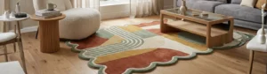 Wide view of a modern living room featuring a geometric scalloped edge rug in off-white, rust, mustard, and sage green, perfectly illustrating the unique curved borders for the blog post what is a scalloped edge rug.