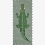 Full top-down view of the rectangular Alligator runner rug isolated on a white background, displaying a large green alligator illustration over a sage green base with wavy scalloped borders.