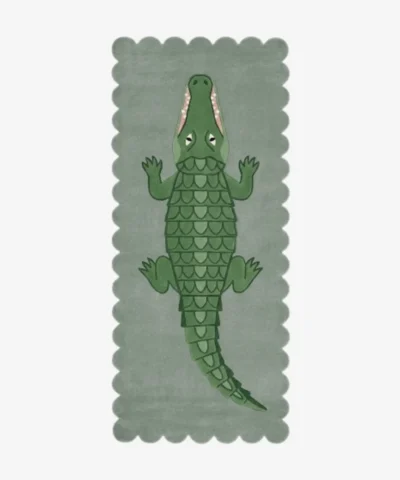 Full top-down view of the rectangular Alligator runner rug isolated on a white background, displaying a large green alligator illustration over a sage green base with wavy scalloped borders.