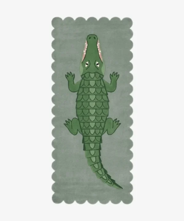 Full top-down view of the rectangular Alligator runner rug isolated on a white background, displaying a large green alligator illustration over a sage green base with wavy scalloped borders.