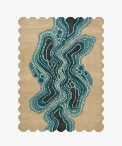 Full top-down view of the rectangular Aqua Drift rug isolated on a plain white background, highlighting its central topographic wavy design in blue and teal tones enclosed by a scalloped border.