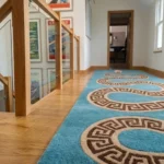 A wide perspective interior shot showing the Azure Serpent Runner rug perfectly styled in a long hallway on a light wood floor.