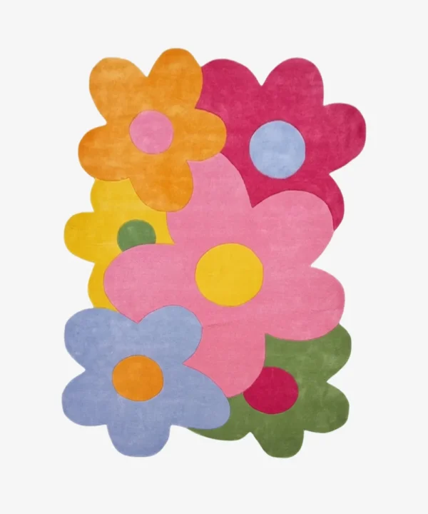 Full top-down product isolated shot of the custom-shaped Bloomtopia accent rug featuring overlapping retro pop art flowers with bright color-blocked petals.