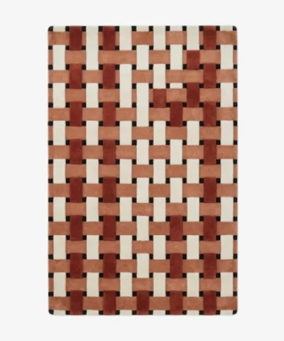 Full top-down product isolated shot of the rectangular Brika Braida area rug, showcasing a dimensional basket weave geometric design with interwoven block straps of terracotta orange, brick red, and ivory cream over small black negative spaces.