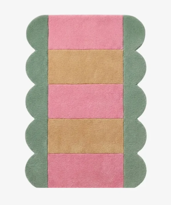 Full top-down product isolated shot of the Candy Stripe scalloped runner rug featuring alternating pink and beige horizontal blocks with a sage green wavy border.