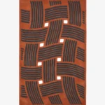 Full top-down product isolated shot of the rectangular Clay Knoty area rug, showcasing a structural basketweave design with raised charcoal grey linear blocks over a rich terracotta orange field with square geometric cutouts.