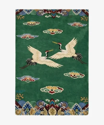 Full top-down product isolated shot of the rectangular green Crane Dynasty area rug featuring two elegant white cranes flying among traditional stylized clouds and ornate borders.