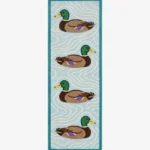 Full top-down product isolated shot of the rectangular light blue runner rug featuring a recurring mallard duck pattern.