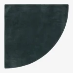 Full top-down product isolated shot of the uniquely shaped Eclipse Arc corner accent rug in a deep charcoal gray tone.