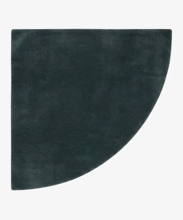 Full top-down product isolated shot of the uniquely shaped Eclipse Arc corner accent rug in a deep charcoal gray tone.