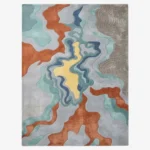 Full top-down isolated product shot of the rectangular Estuary area rug featuring fluid topographical waves in grey, terracotta, aqua, and a central pale yellow pool.