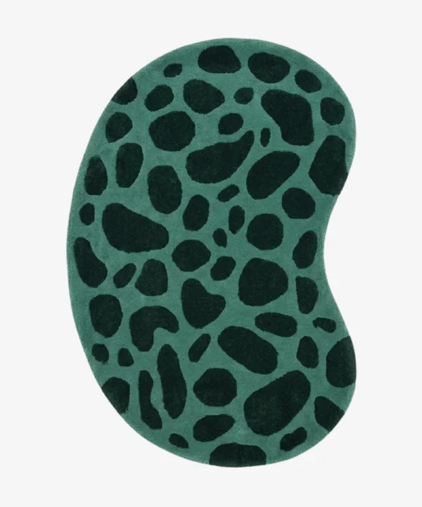 Full top-down product isolated shot of the uniquely kidney bean shaped Fernfall area rug featuring an organic pebble mosaic pattern in deep green and black blocks.