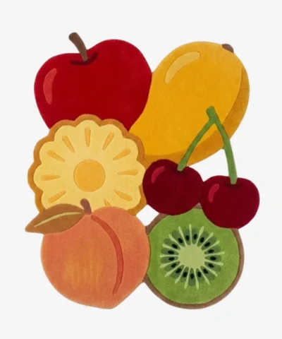 Full top-down product isolated shot of the custom-shaped Frutopia Harvest area rug, featuring an eclectic pop art collection of overlapping fruits including a red apple, yellow mango, pineapple slice, orange peach, green kiwi, and red cherries.