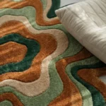 Low angle close-up floor perspective showcasing the plush hand-tufted pile and dynamic wavy color sections of the Groovy flower rug.