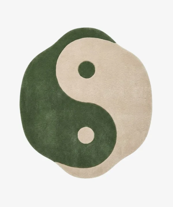 Full top-down view of the Harmony Flow rug isolated on a plain white background, featuring a classic yin yang design rendered in solid blocks of sage green and off-white.