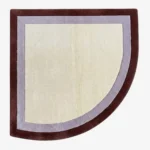 Full top-down product isolated shot of the uniquely shaped Lilac Horizon corner accent rug featuring concentric bands of cream, soft lilac, and deep brown.