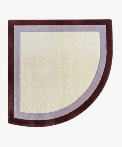 Full top-down product isolated shot of the uniquely shaped Lilac Horizon corner accent rug featuring concentric bands of cream, soft lilac, and deep brown.
