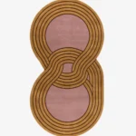 Full top-down product isolated shot of the custom figure-eight shaped Luma Loop area rug, featuring an overlapping retro geometric infinity design with multi-lined tracks in mustard gold and dusty rose pink.