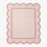 Full top-down product isolated shot of the light pink and dusty rose Morganite Crystal scalloped area rug.