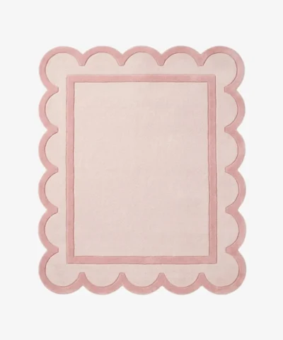 Full top-down product isolated shot of the light pink and dusty rose Morganite Crystal scalloped area rug.