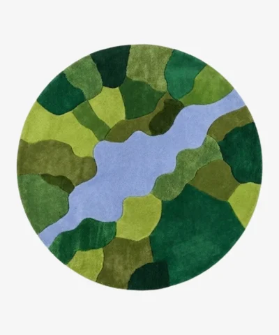 Full top-down product isolated shot of the circular Mossbrook abstract area rug featuring a multi-toned green mosaic pattern bisected by a soft blue winding river stream.