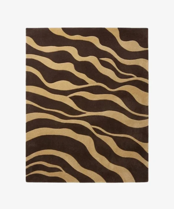 Full top-down product isolated shot of the rectangular Sable Drift area rug featuring an organic wavy abstract pattern in alternating flowing blocks of dark espresso brown and sandy beige.