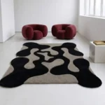 Low side-angle perspective close-up showing the plush pile depth and unique organic edge profile of the Shadow Morph rug.
