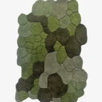 Full top-down product isolated shot of the organic, stone-patterned Stone Moss area rug in various shades of green.
