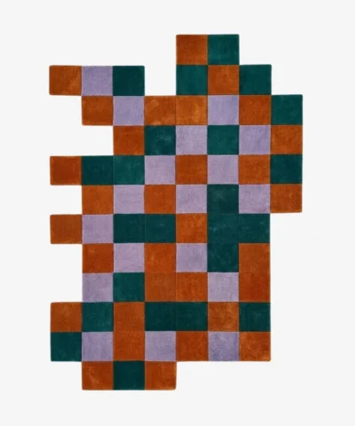 Full top-down product isolated shot of the uniquely shaped Terra Mosaic irregular area rug featuring a rust, teal, and lavender checkered pattern.