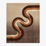 Full top-down product isolated shot of the rectangular Walnut Current area rug, featuring an ombre gradient background from taupe to dark brown accented by a central flowing wavy ribbon stripe in chocolate brown, terracotta orange, and cream.