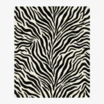 A top-down studio product photograph of a rectangular area rug featuring a classic black-and-white zebra animal print pattern on a clean background.