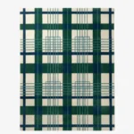 A full top-down studio photograph of the rectangular Evergreen Plaid area rug, showcasing a classic tartan-inspired geometric pattern in deep forest green, navy blue, and off-white.