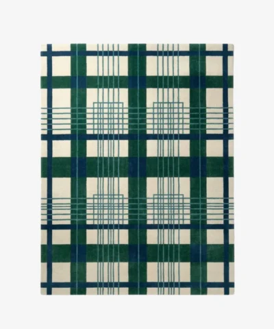 A full top-down studio photograph of the rectangular Evergreen Plaid area rug, showcasing a classic tartan-inspired geometric pattern in deep forest green, navy blue, and off-white.