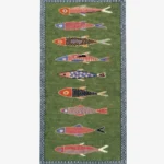 A top-down studio product shot of the green rectangular runner rug with a vertical sequence of diverse, colorful, hand-knotted fish illustrations.